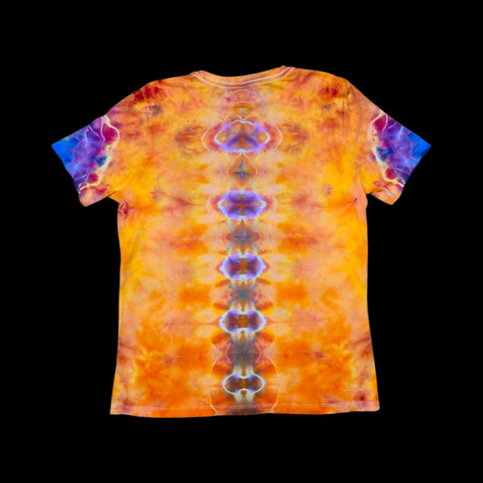 Back of the tie-dye tee showing a vertical spine of purple and blue medallions on an orange and gold field.