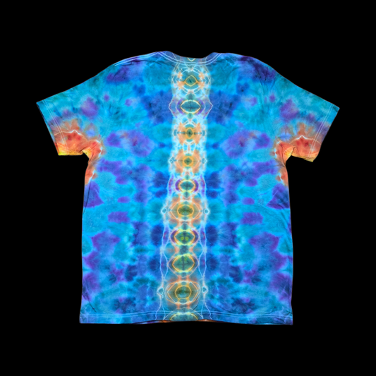 Back of the tie-dyed T-shirt showing a vertical spine of orange and gold geode ovals against turquoise, blue, and purple ice dye.