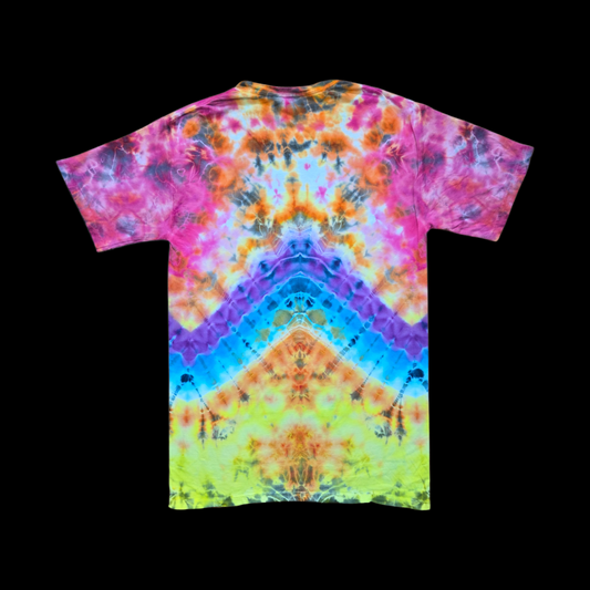 Back of the tee showing a symmetrical chevron pattern in pink, orange, purple, blue and yellow-green.