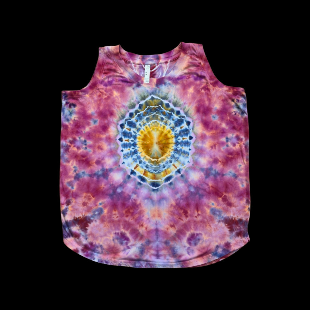 Front of a purple and pink tie-dyed women's tank top with a golden-yellow mandala centered on the chest.