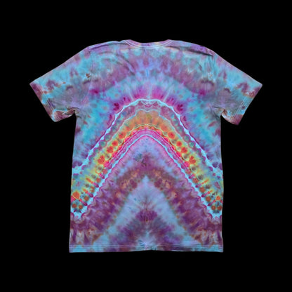 Back of the tie-dyed t-shirt showing a large V-shaped rainbow geode of stacked chevrons in purple, blue, pink, and orange.