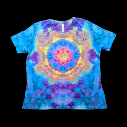 A short-sleeve crewneck tie-dye t-shirt featuring a large, vibrant mandala design in the center. The shirt is colored in a mix of blue, purple, yellow, and orange, and is displayed flat against a solid black background.