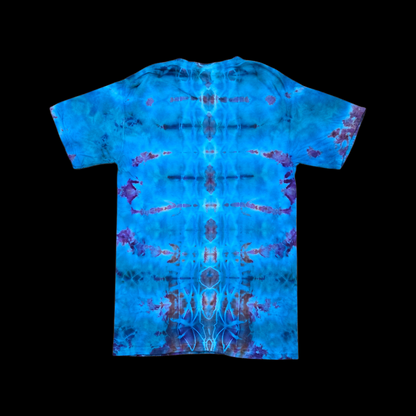 Back of the tee showing blue, purple, and rust ice-dye bursts mirrored symmetrically down the center.