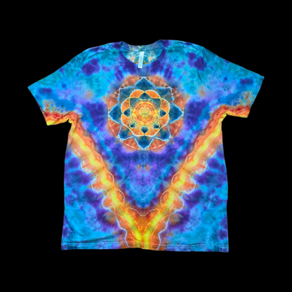Front of a tie-dyed T-shirt with an orange and yellow mandala on the chest surrounded by blue and purple radiating into a V shape.