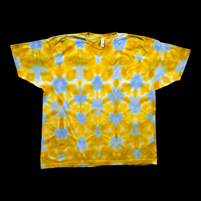 Front of a 2XL tee with an equilateral triangle shibori pattern in gold, yellow, light blue, and periwinkle arranged in symmetrical rows.