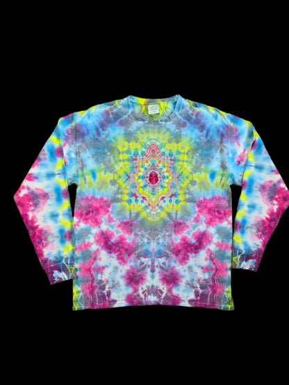 Front of a long sleeve tie dye shirt with a mirrored mandala ice dye centered on the chest in yellow, magenta, blue, gray, and white.