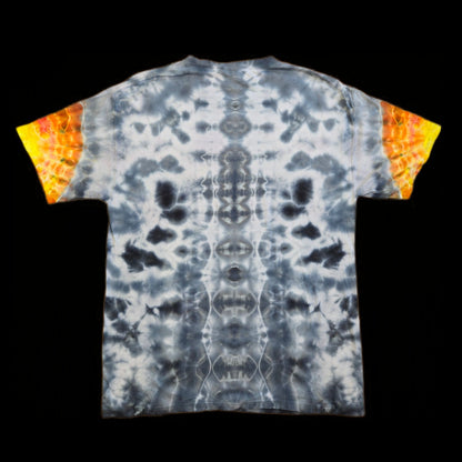 Back of shirt shows a vertical spine-like pattern in gray and white with symmetrical mirrored cloud formations on either side.